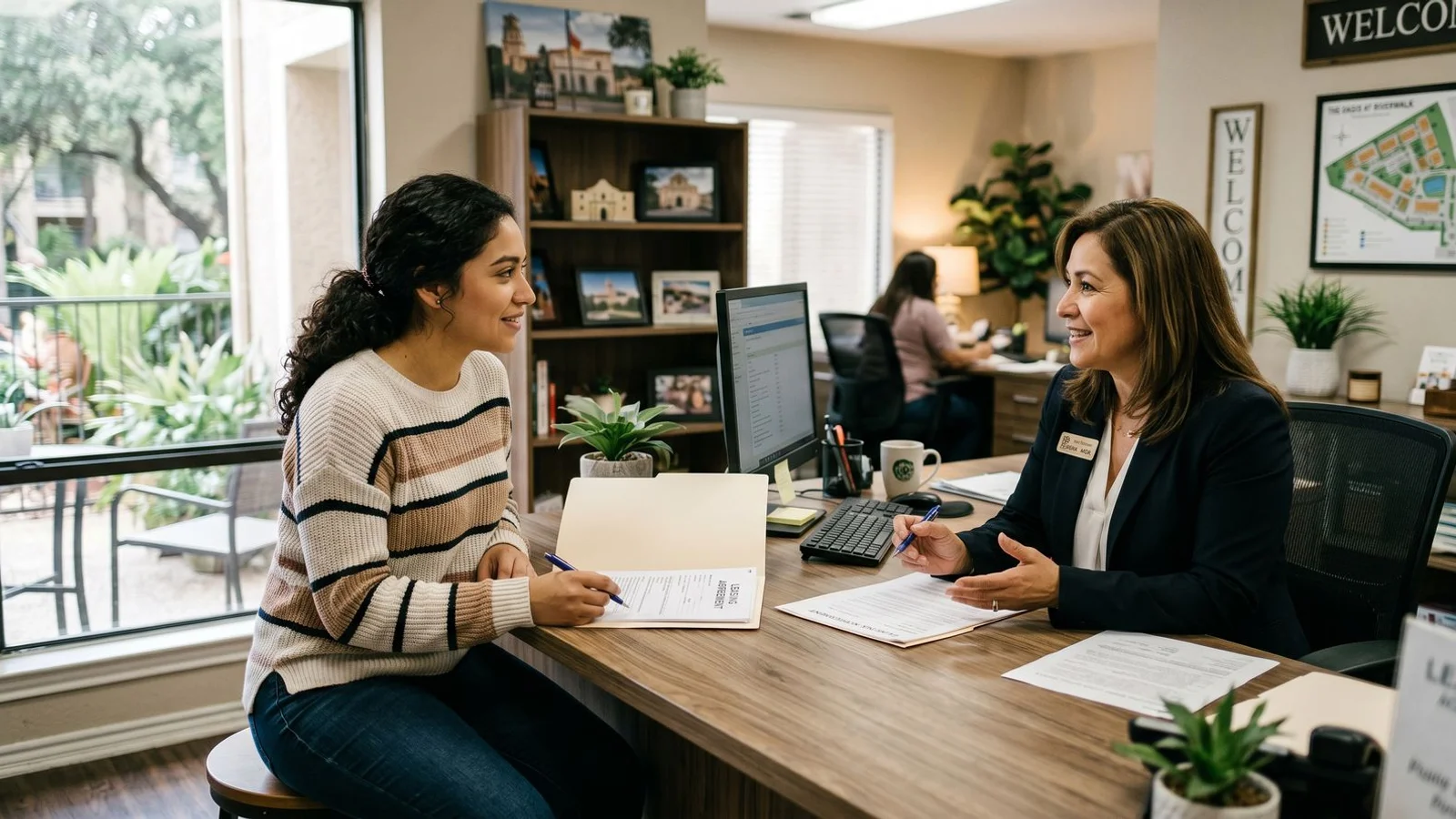 Renter talking to a leasing office manager about case-by-case approval